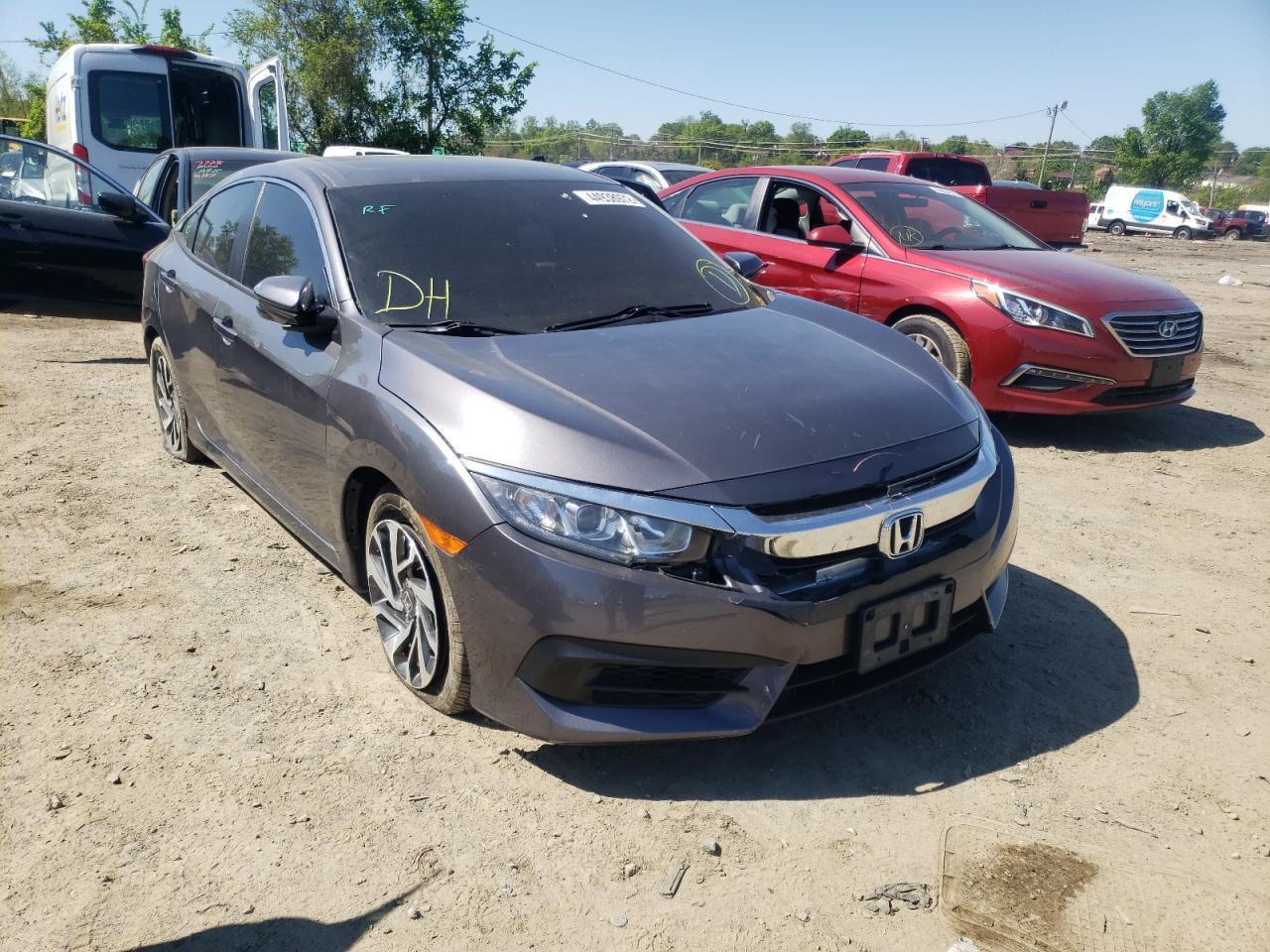 HONDA CIVIC EX 2018 with VIN 2HGFC2F74JH540211 - Photo from auction