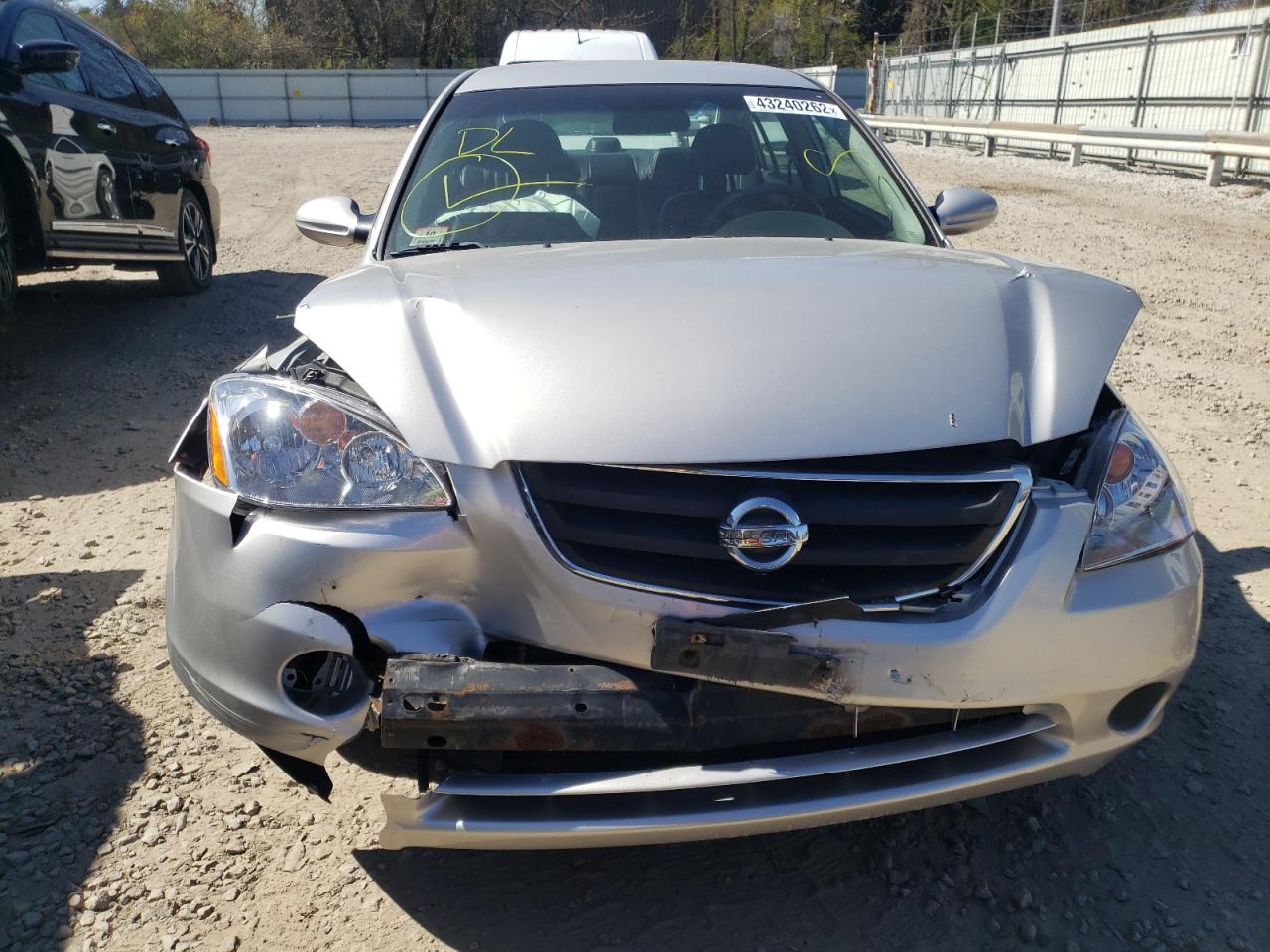 Photo 9 from auction – 2003 NISSAN ALTIMA BAS with VIN 1N4AL11D33C340352