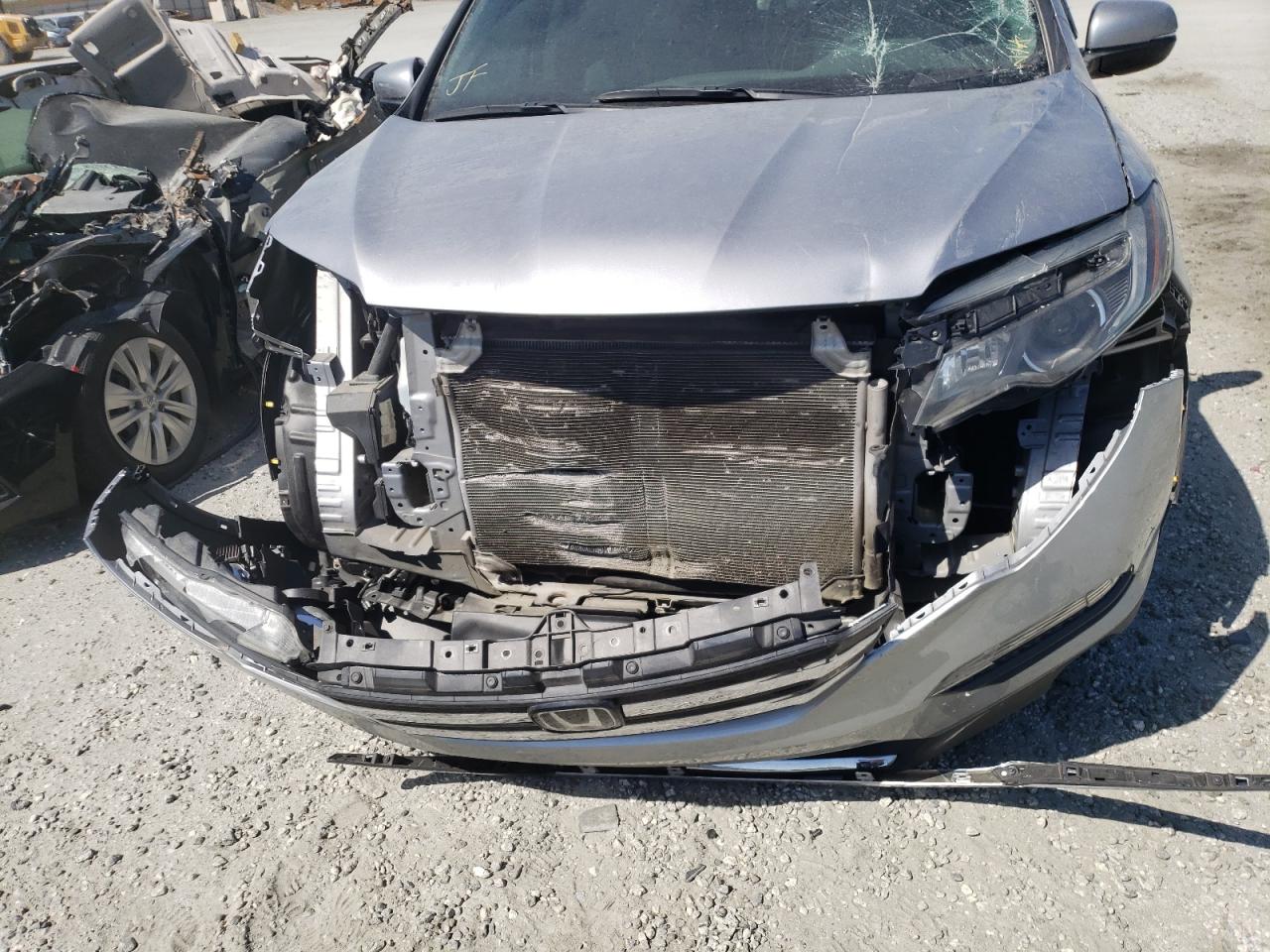 Photo 9 from auction – 2017 HONDA PILOT ELIT with VIN 5FNYF6H03HB049117