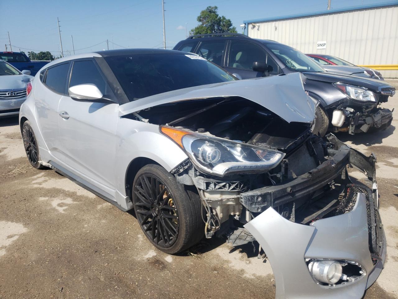 HYUNDAI VELOSTER T 2014 with VIN KMHTC6AE9EU199272 - Photo from auction