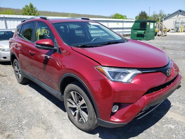 TOYOTA RAV4 ADVEN 2018 with VIN 2T3RFREV5JW714928 - Photo from auction