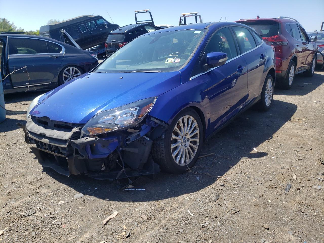 Photo 2 from auction – 2012 FORD FOCUS TITA with VIN 1FAHP3J20CL413044
