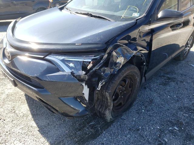 Photo 9 from auction – 2017 TOYOTA RAV4 LE with VIN JTMZFREV7HJ129146