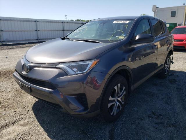 Photo 2 from auction – 2018 TOYOTA RAV4 LE with VIN JTMBFREV9JJ737726