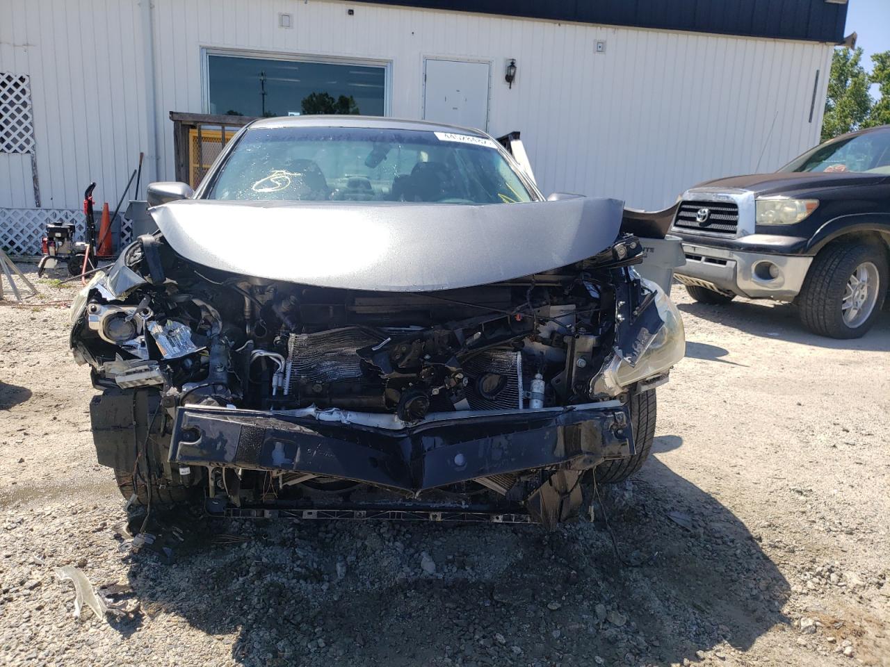 Photo 9 from auction – 2015 NISSAN ALTIMA 2.5 with VIN 1N4AL3AP6FC215209
