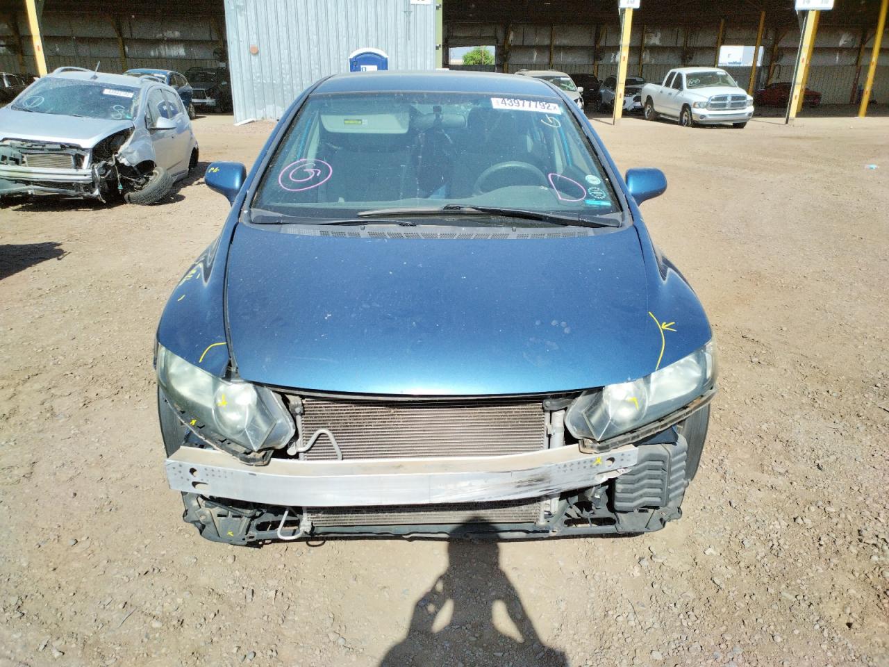 Photo 9 from auction – 2011 HONDA CIVIC LX with VIN 19XFA1F57BE018702