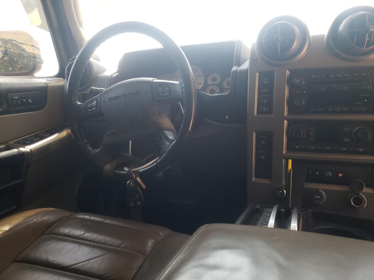 Photo 9 from auction – 2003 HUMMER H2 with VIN 5GRGN23U33H142857