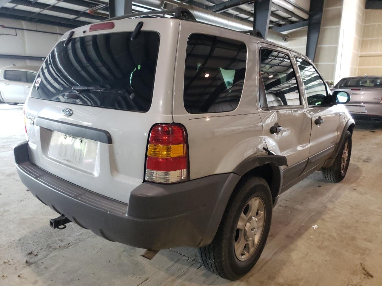 Photo 4 from auction – 2002 FORD ESCAPE XLT with VIN 1FMCU04142KB43847