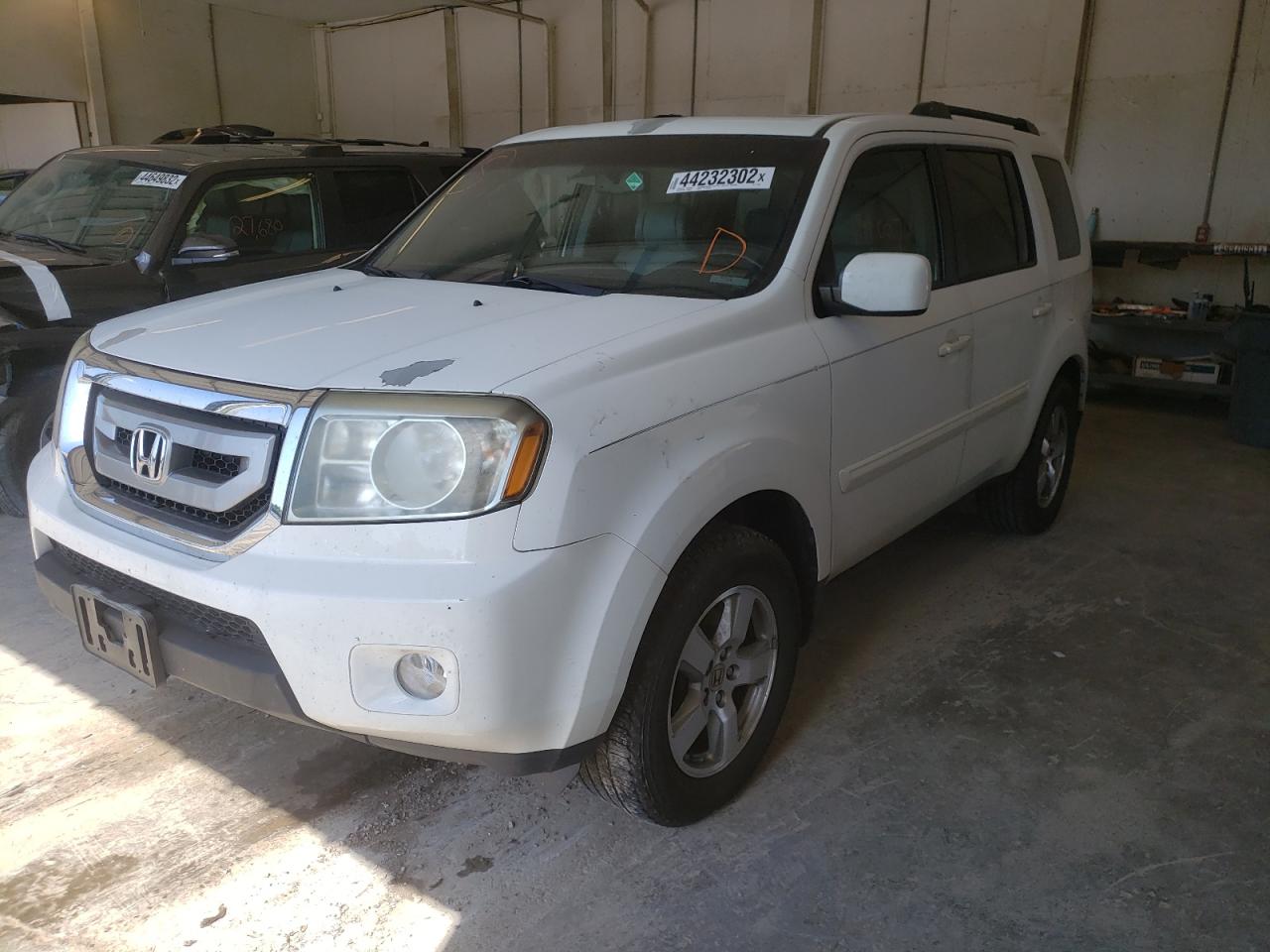 Photo 2 from auction – 2011 HONDA PILOT EXL with VIN 5FNYF3H52BB047960