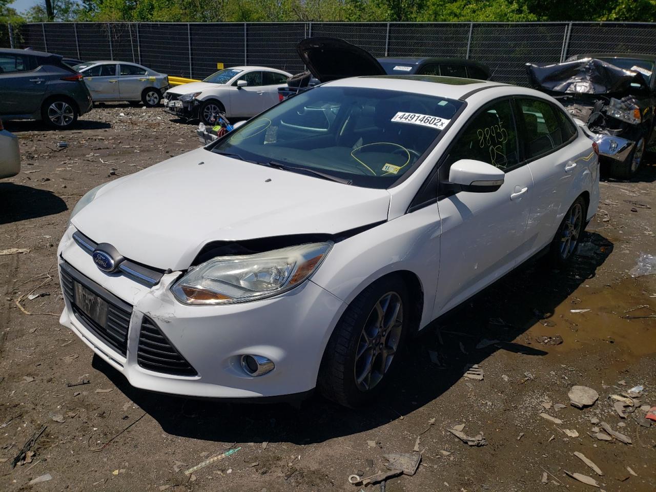 Photo 2 from auction – 2014 FORD FOCUS SE with VIN 1FADP3F28EL368803