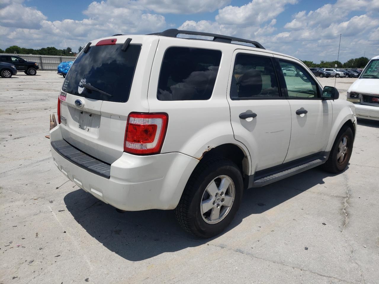 Photo 4 from auction – 2009 FORD ESCAPE XLT with VIN 1FMCU03G79KB62036