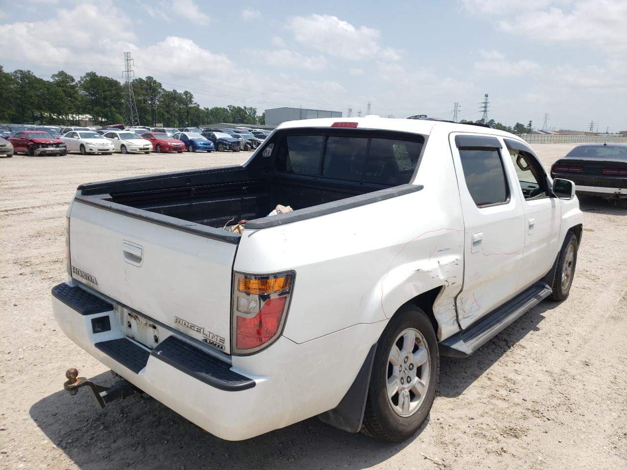 Photo 4 from auction – 2007 HONDA RIDGELINE with VIN 2HJYK16557H520962