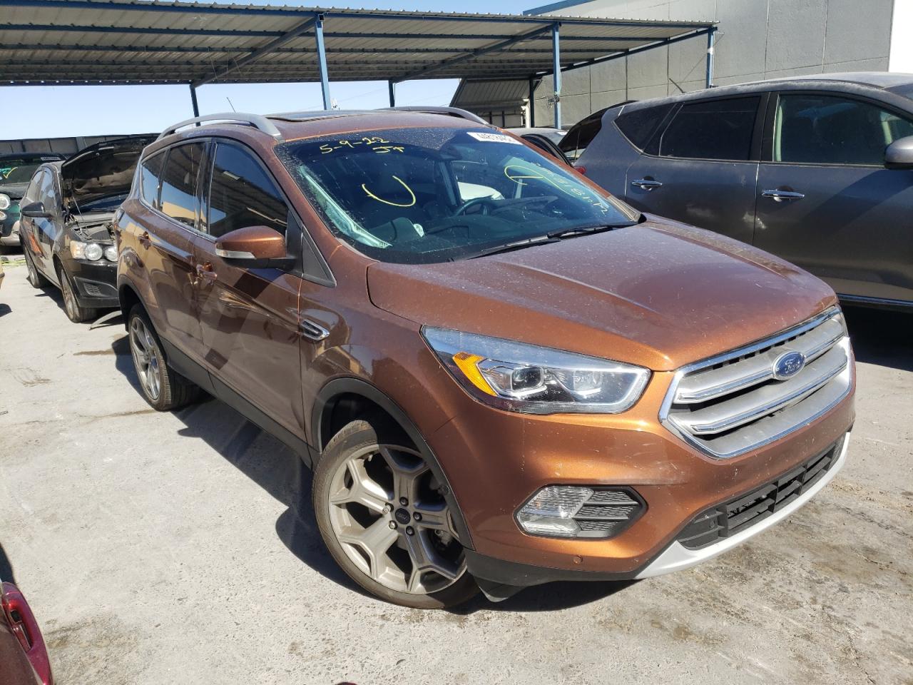 FORD ESCAPE 2017 with VIN 1FMCU9J90HUC50308 - Photo from auction