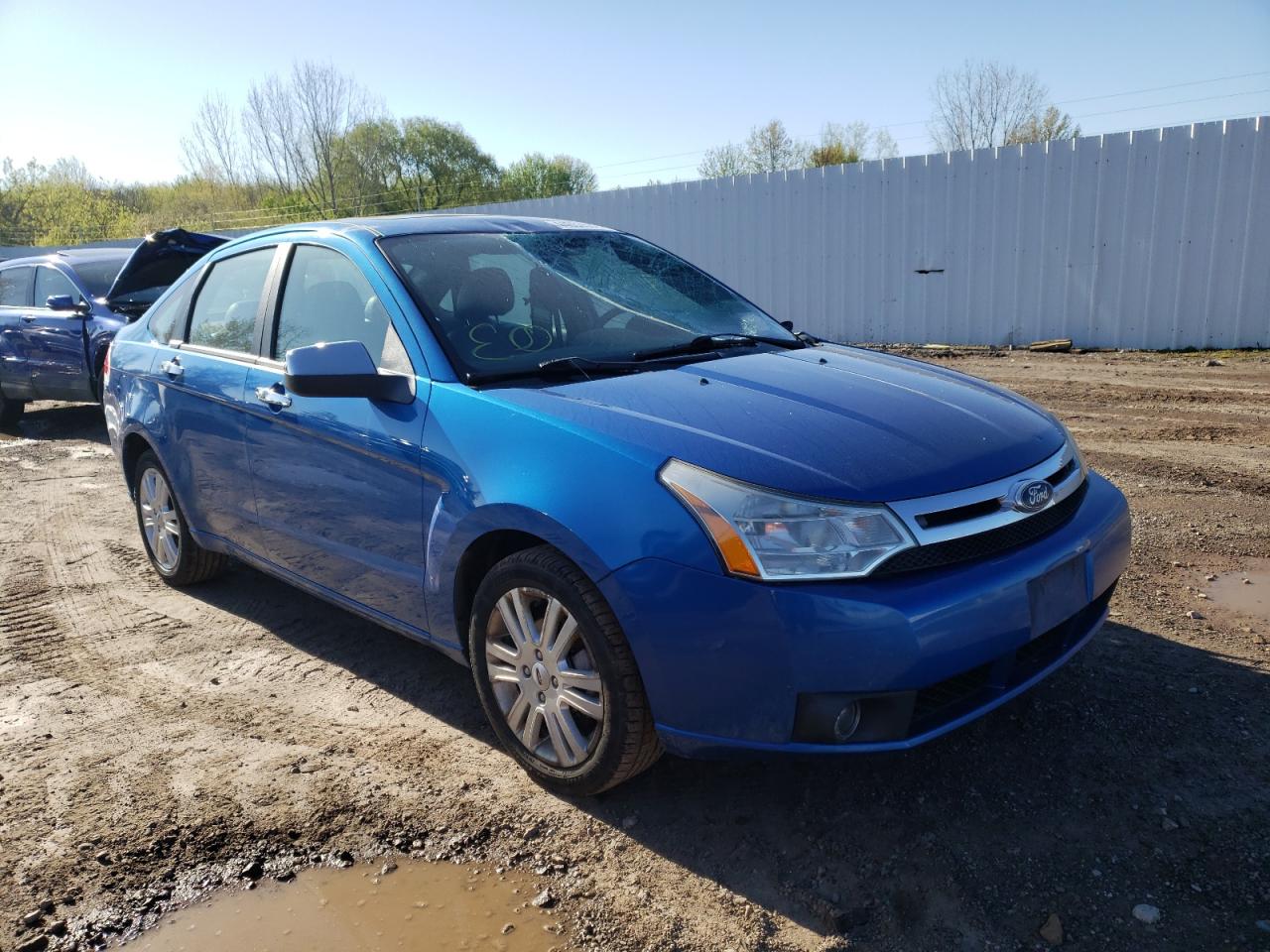 FORD FOCUS SEL 2011 with VIN 1FAHP3HN9BW148511 - Photo from auction