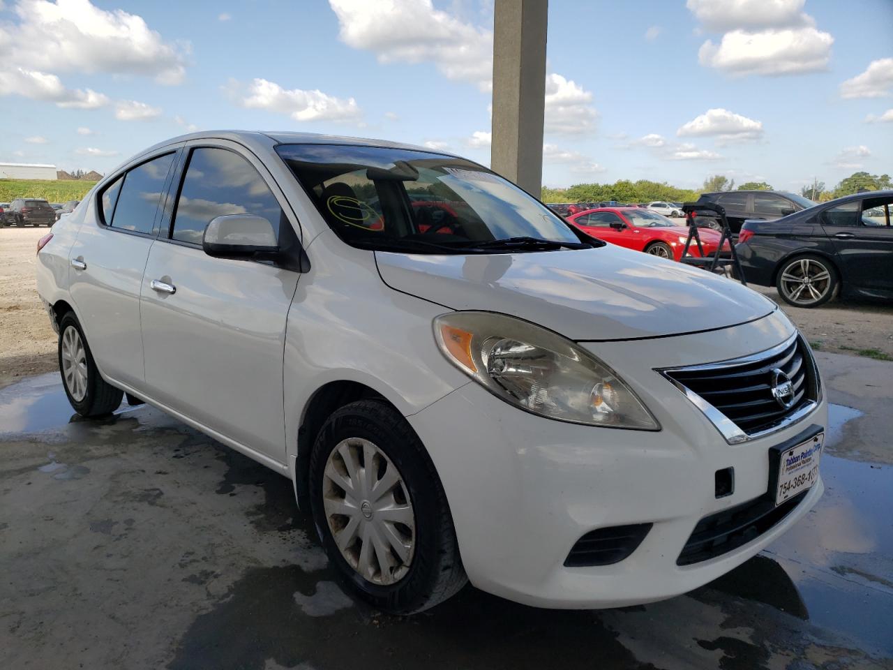 NISSAN VERSA S 2014 with VIN 3N1CN7AP5EK460311 - Photo from auction
