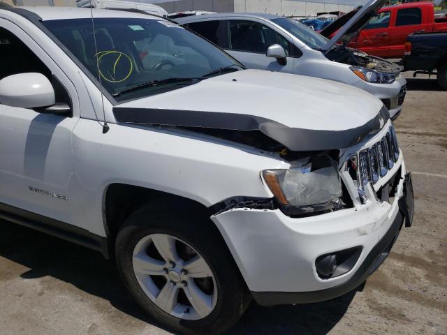 Photo 9 from auction – 2014 JEEP COMPASS LA with VIN 1C4NJDEB4ED665763
