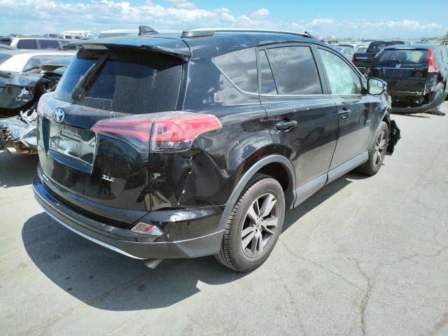 Photo 4 from auction – 2016 TOYOTA RAV4 XLE with VIN 2T3WFREV1GW239743