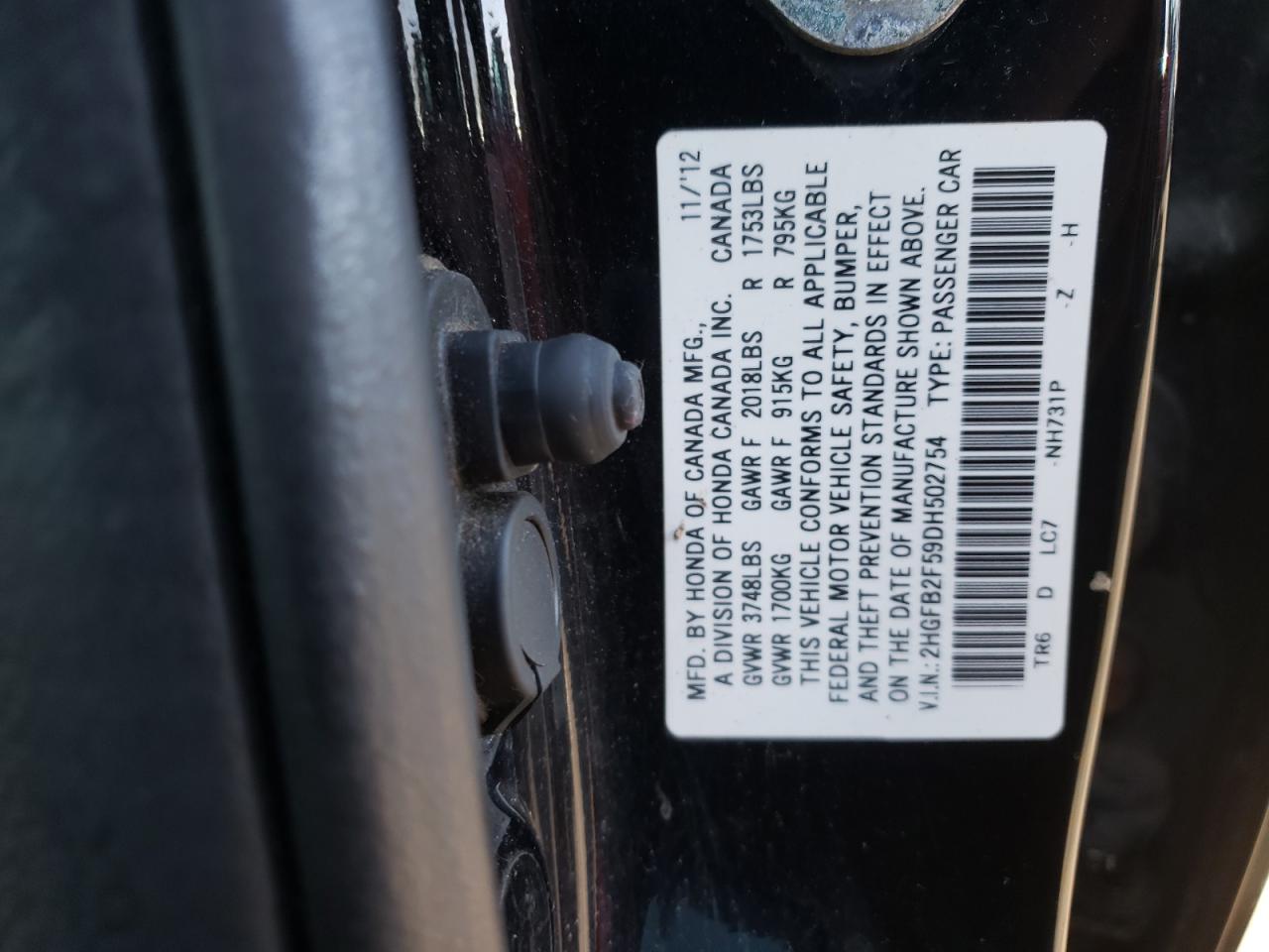 Photo 10 from auction – 2013 HONDA CIVIC LX with VIN 2HGFB2F59DH502754