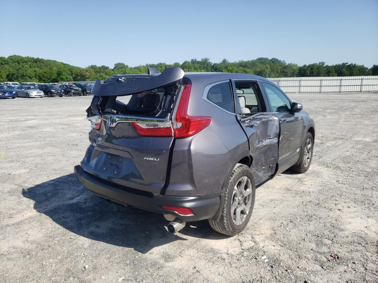 Photo 4 from auction – 2017 HONDA CR-V EXL with VIN 2HKRW2H80HH669508