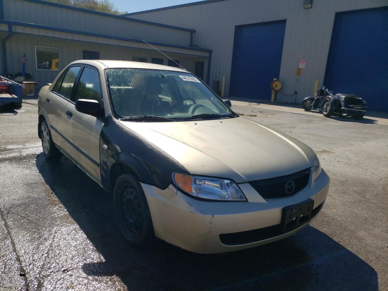 MAZDA PROTEGE DX 2003 with VIN JM1BJ225830179001 - Photo from auction