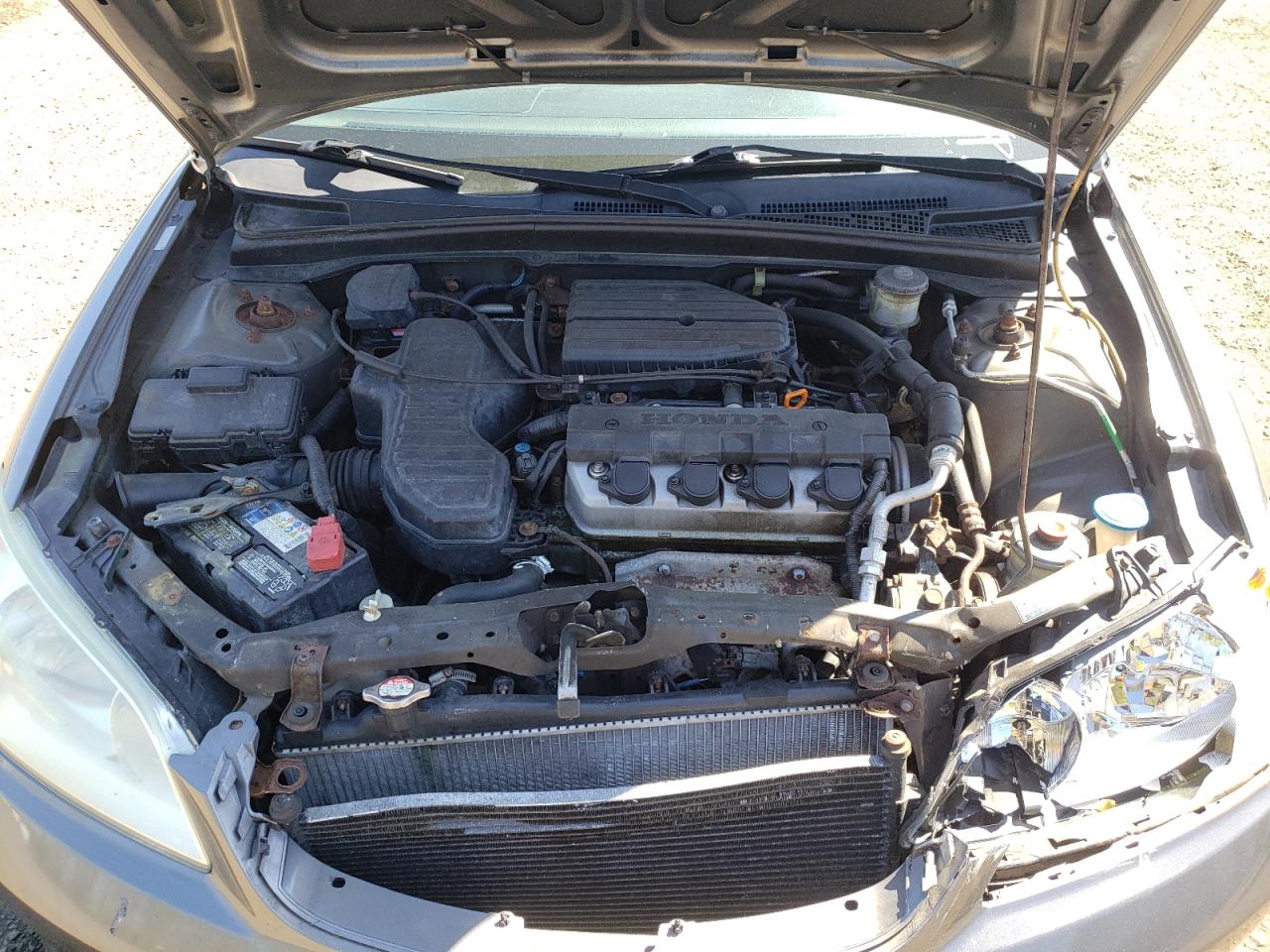 Photo 7 from auction – 2004 HONDA CIVIC LX with VIN 2HGES16624H632034