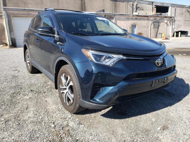 TOYOTA RAV4 LE 2017 with VIN JTMZFREV7HJ129146 - Photo from auction