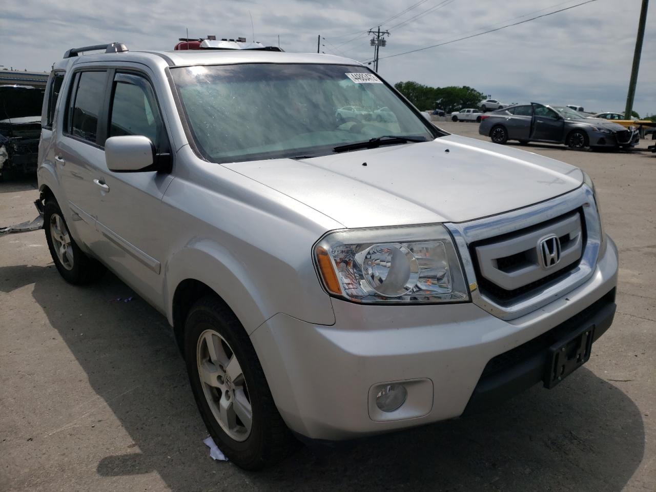 HONDA PILOT EXL 2011 with VIN 5FNYF4H54BB017915 - Photo from auction