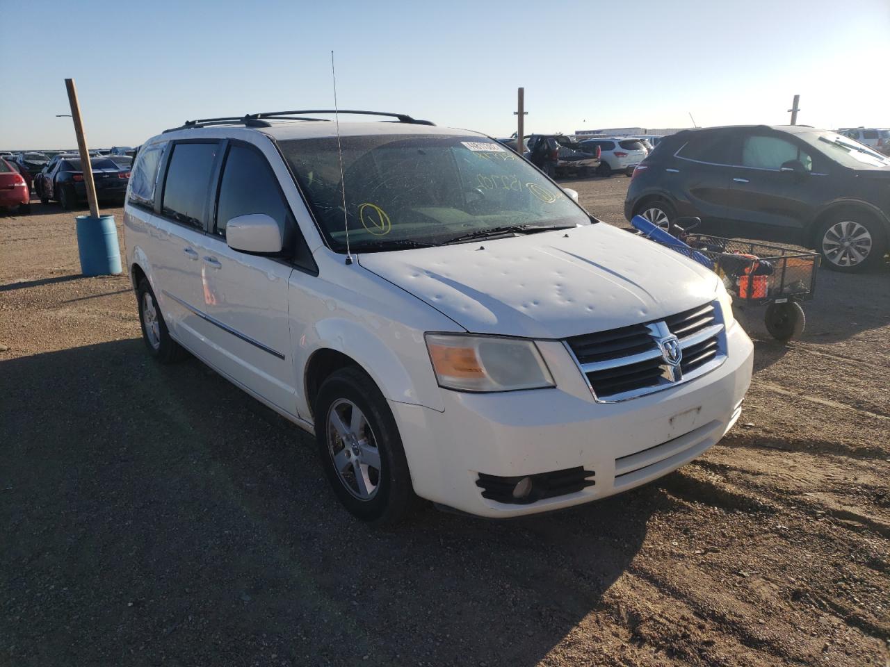 DODGE GRAND CARA 2010 with VIN 2D4RN5D16AR417254 - Photo from auction