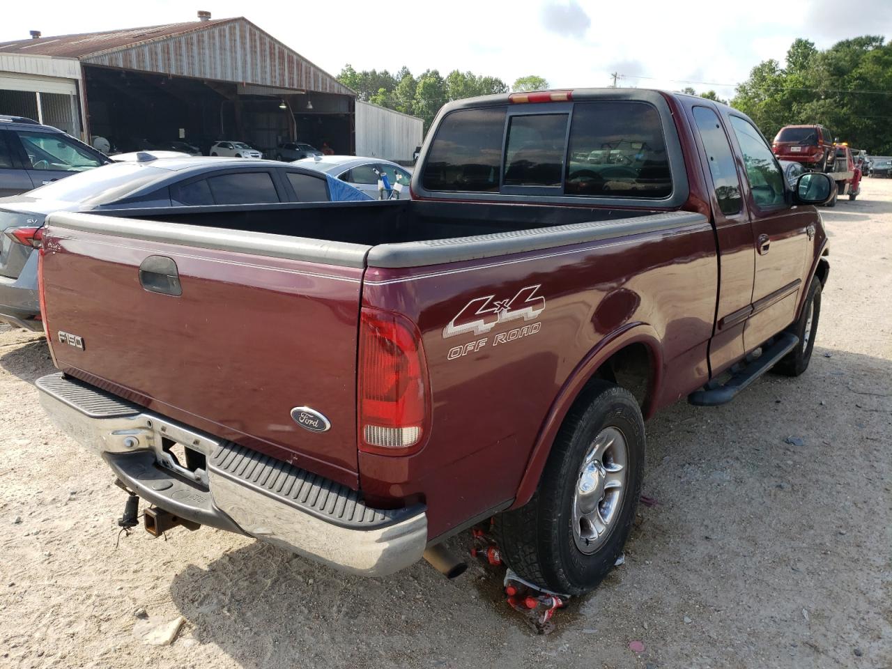 Photo 4 from auction – 1999 FORD F150 with VIN 1FTRX18L4XKB95980