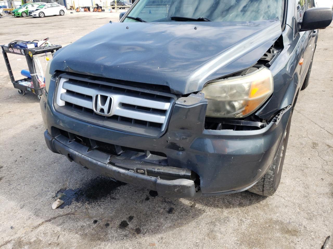 Photo 9 from auction – 2006 HONDA PILOT LX with VIN 5FNYF28106B045296