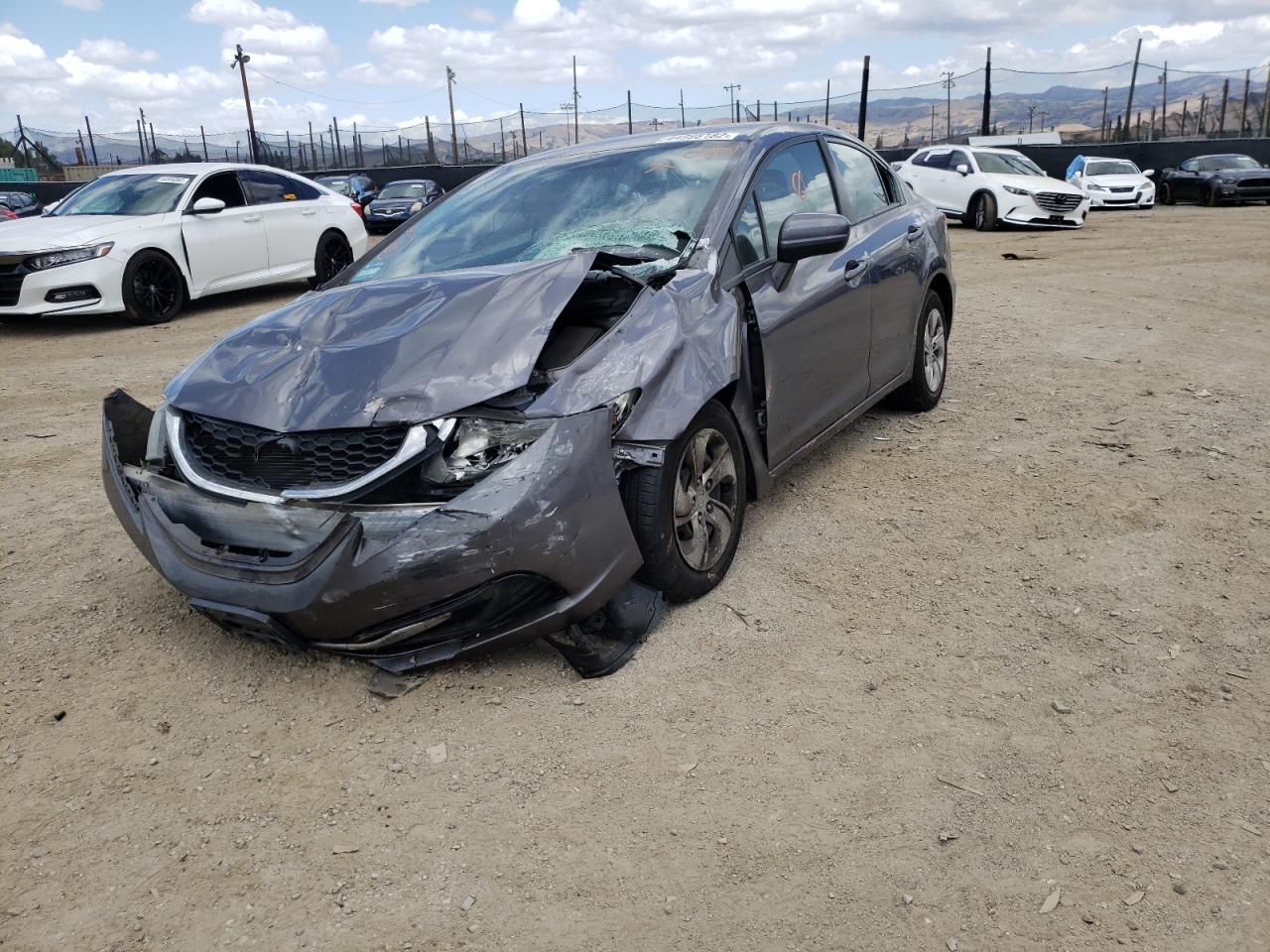 Photo 2 from auction – 2014 HONDA CIVIC LX with VIN 19XFB2F56EE263157