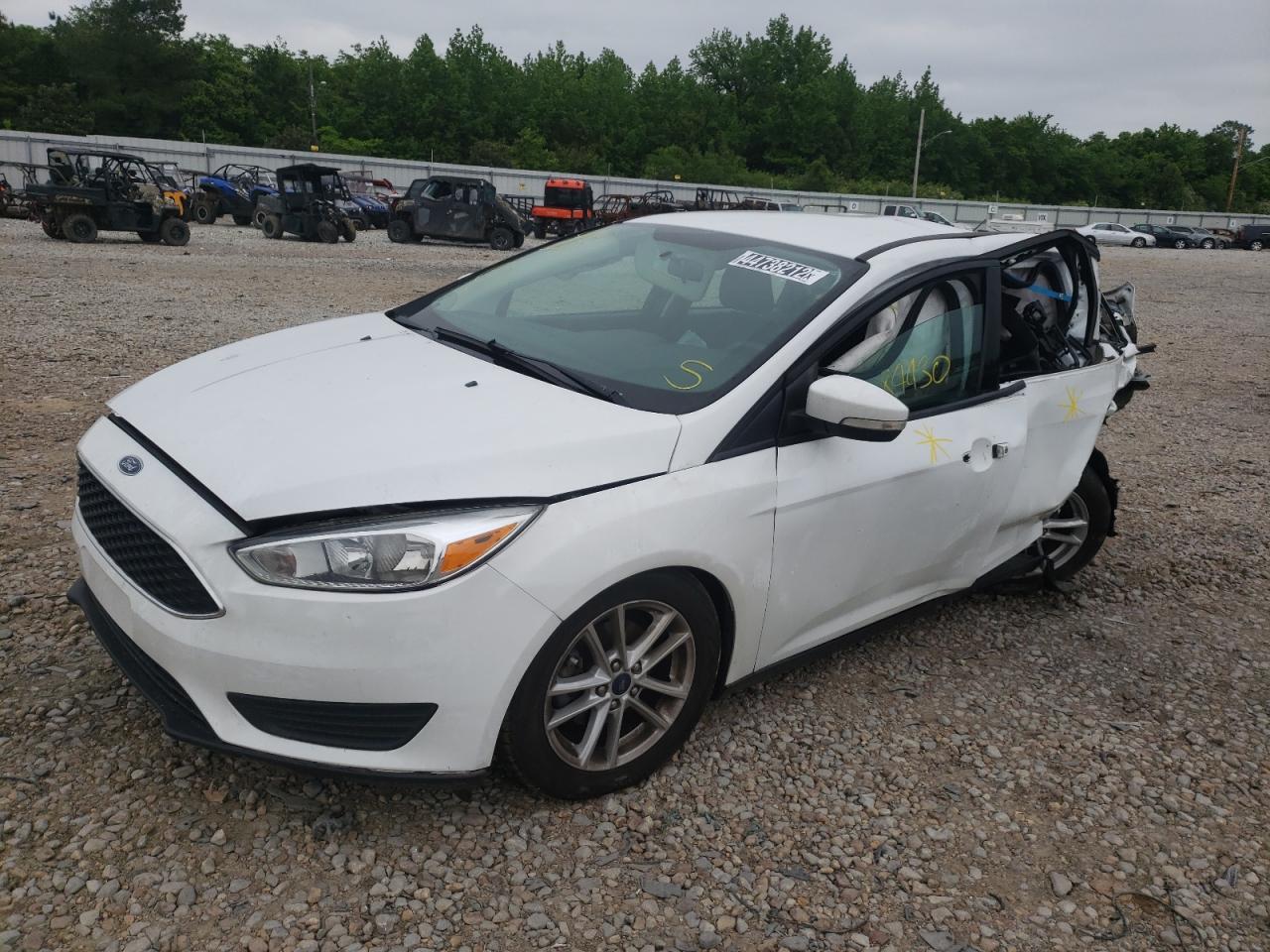Photo 2 from auction – 2016 FORD FOCUS SE with VIN 1FADP3F21GL296653