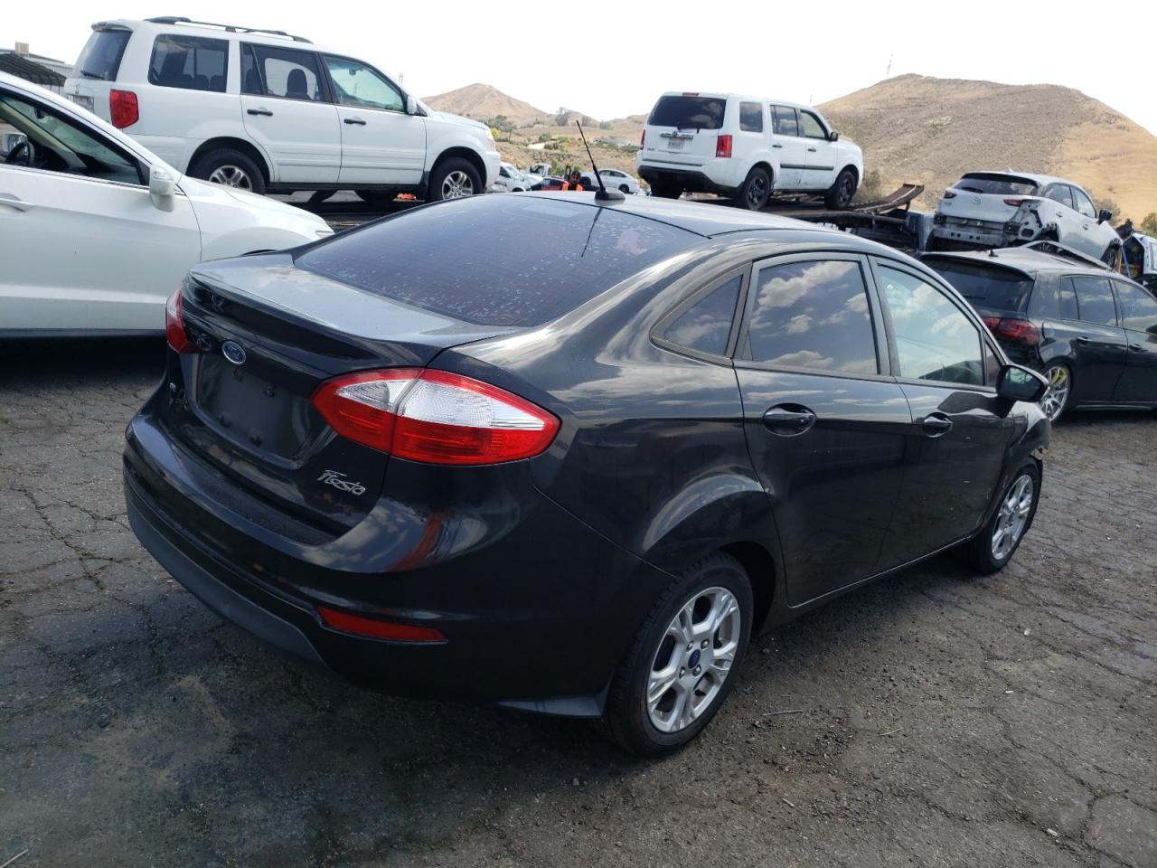 Photo 16 from auction – 2014 FORD FIESTA SE with VIN 3FADP4BJ9EM190823