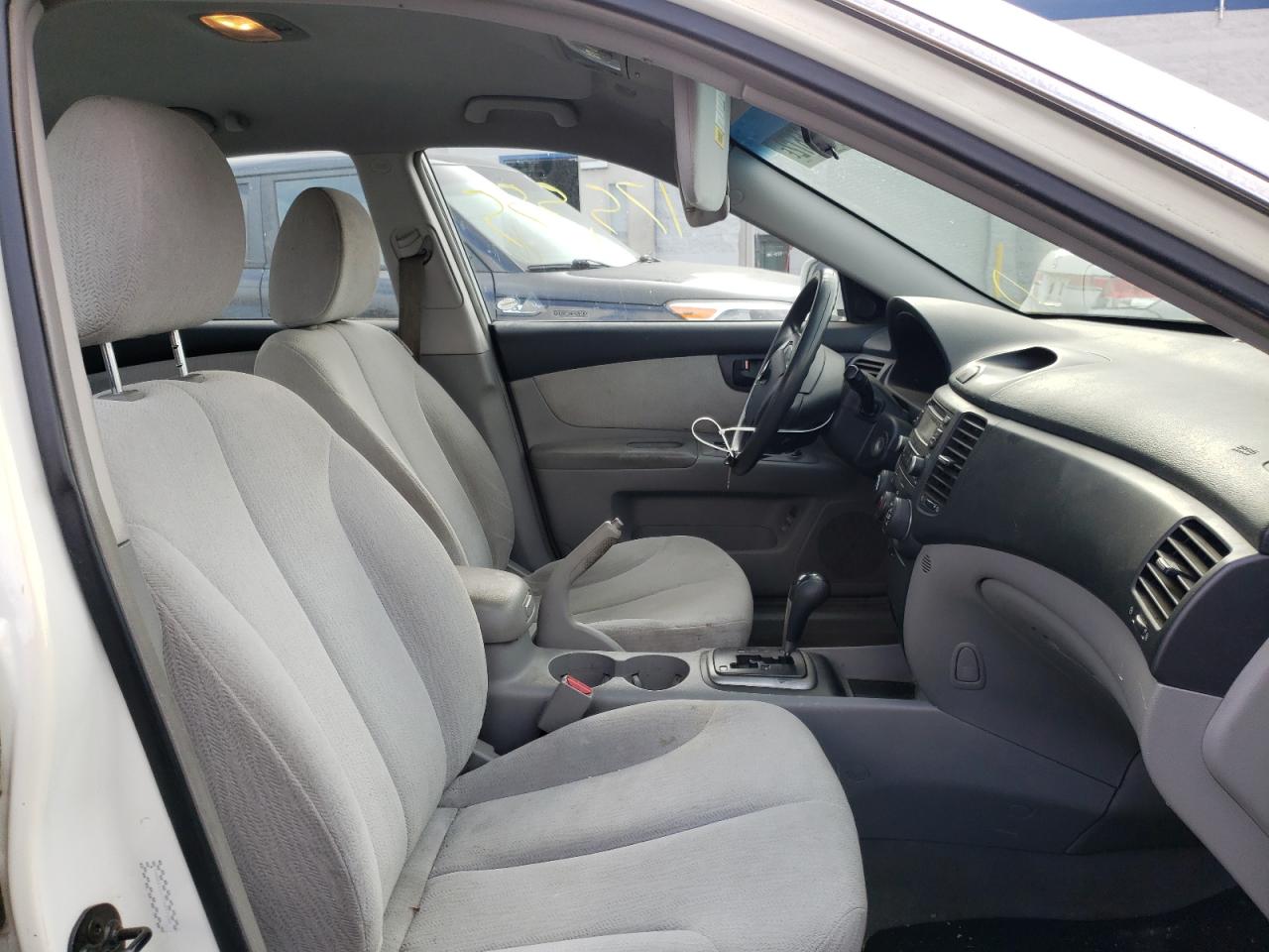 Photo 5 from auction – 2007 KIA OPTIMA LX with VIN KNAGE124775097648