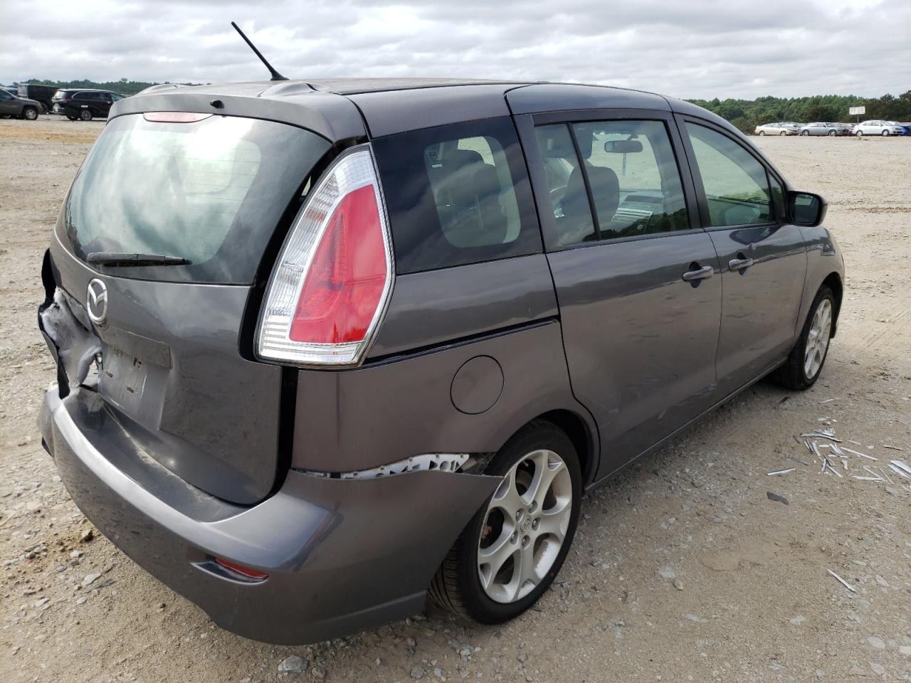 Photo 4 from auction – 2010 MAZDA 5 with VIN JM1CR2W3XA0368641