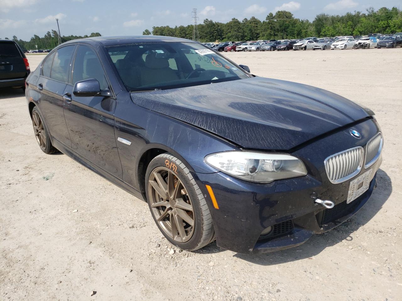BMW 550 XI 2013 with VIN WBAFU9C5XDDY71140 - Photo from auction