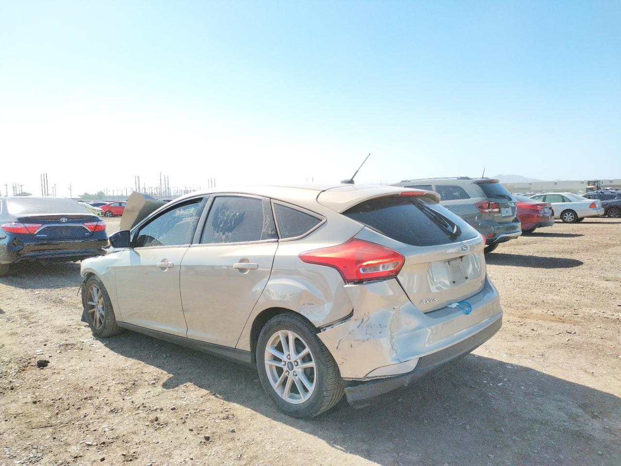 Photo 3 from auction – 2015 FORD FOCUS SE with VIN 1FADP3K22FL211176