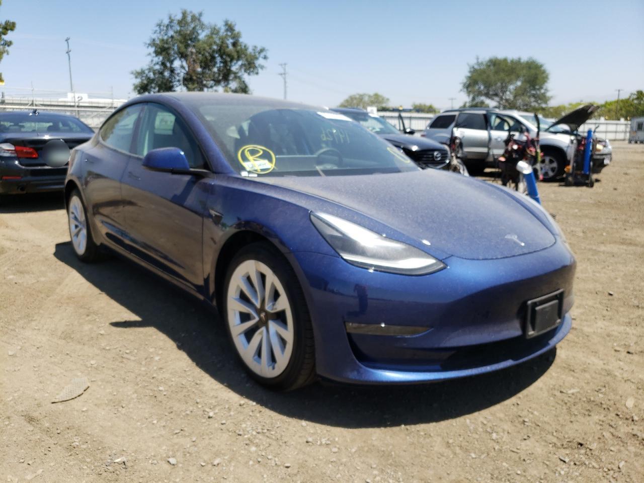 TESLA MODEL 3 2022 with VIN 5YJ3E1EB9NF144802 - Photo from auction