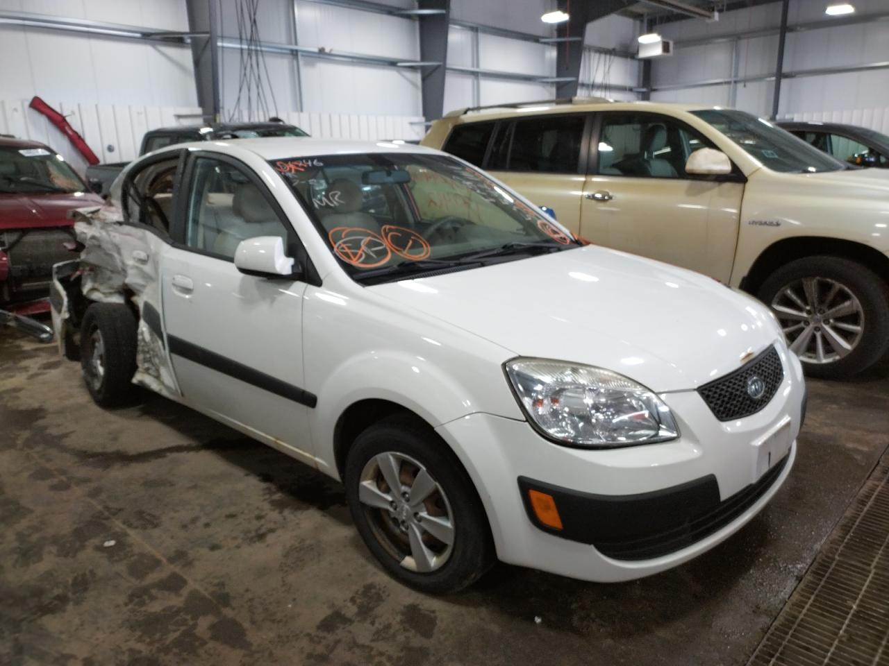 KIA RIO BASE 2009 with VIN KNADE223296522920 - Photo from auction