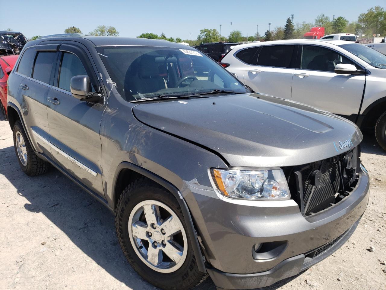 JEEP GRAND CHER 2011 with VIN 1J4RR4GG2BC614941 - Photo from auction