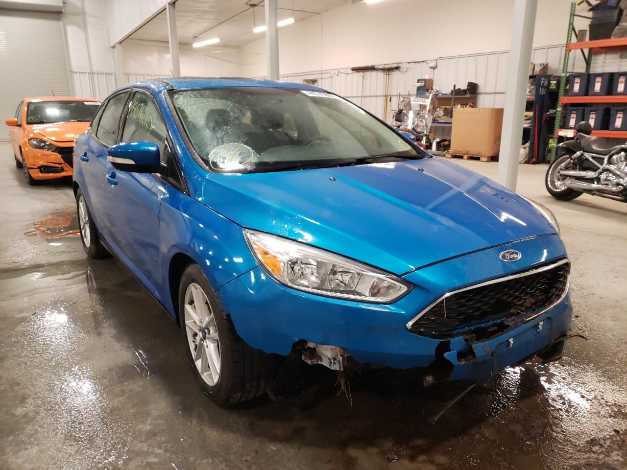 FORD FOCUS SE 2015 with VIN 1FADP3F25FL357775 - Photo from auction