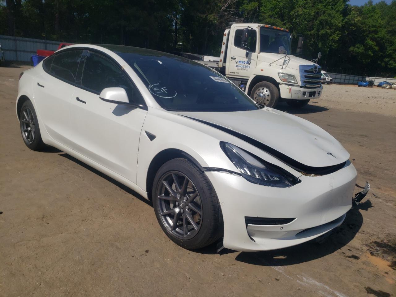 TESLA MODEL 3 2021 with VIN 5YJ3E1EA7MF853699 - Photo from auction