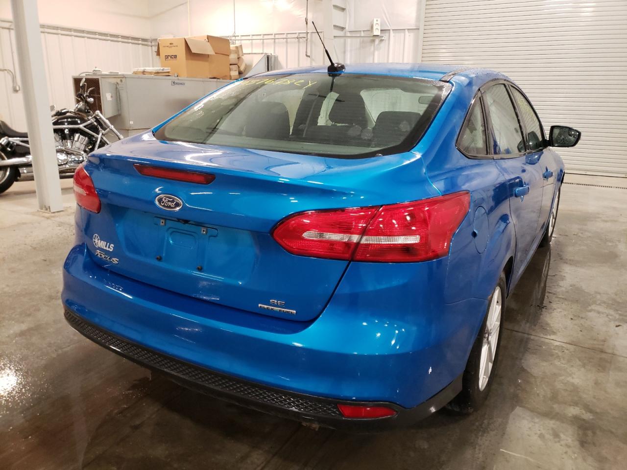 Photo 4 from auction – 2015 FORD FOCUS SE with VIN 1FADP3F25FL357775