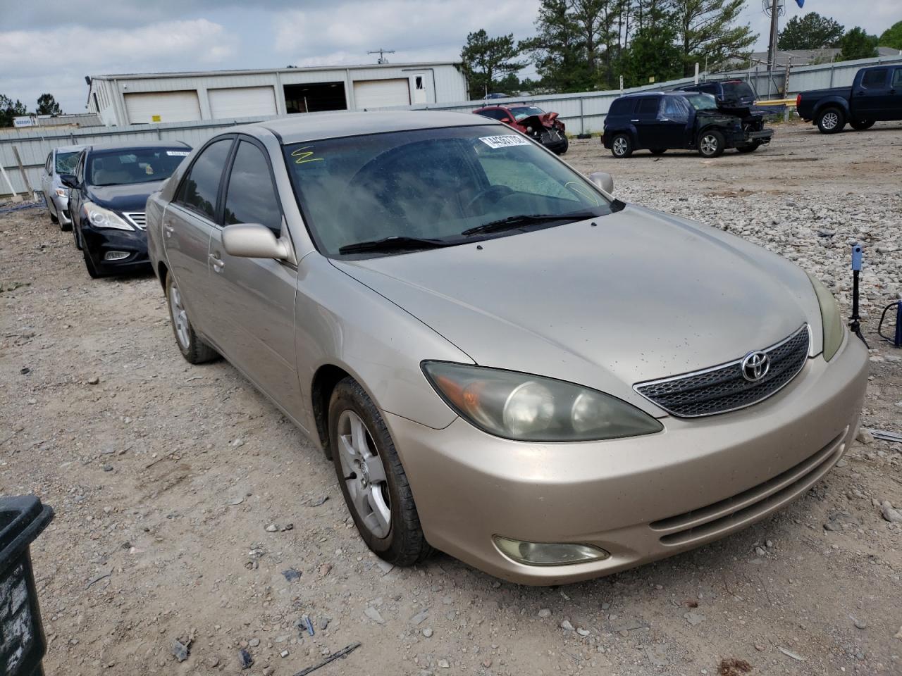 TOYOTA CAMRY LE 2002 with VIN 4T1BF32K22U514138 - Photo from auction