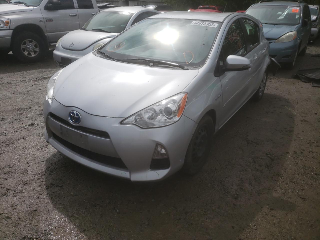 Photo 2 from auction – 2014 TOYOTA PRIUS C with VIN JTDKDTB34E1067272