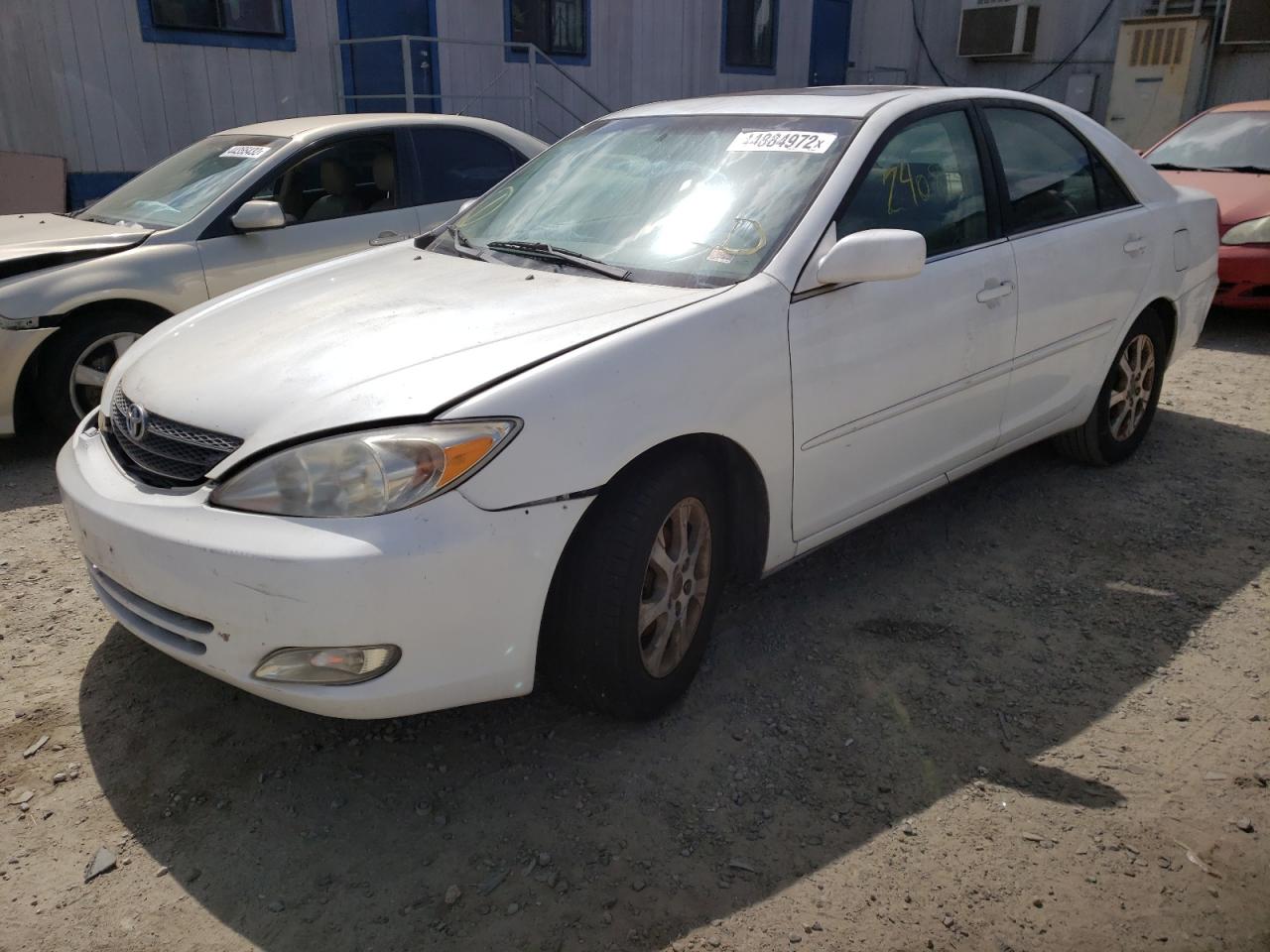 Photo 2 from auction – 2004 TOYOTA CAMRY LE with VIN JTDBE32K340268279