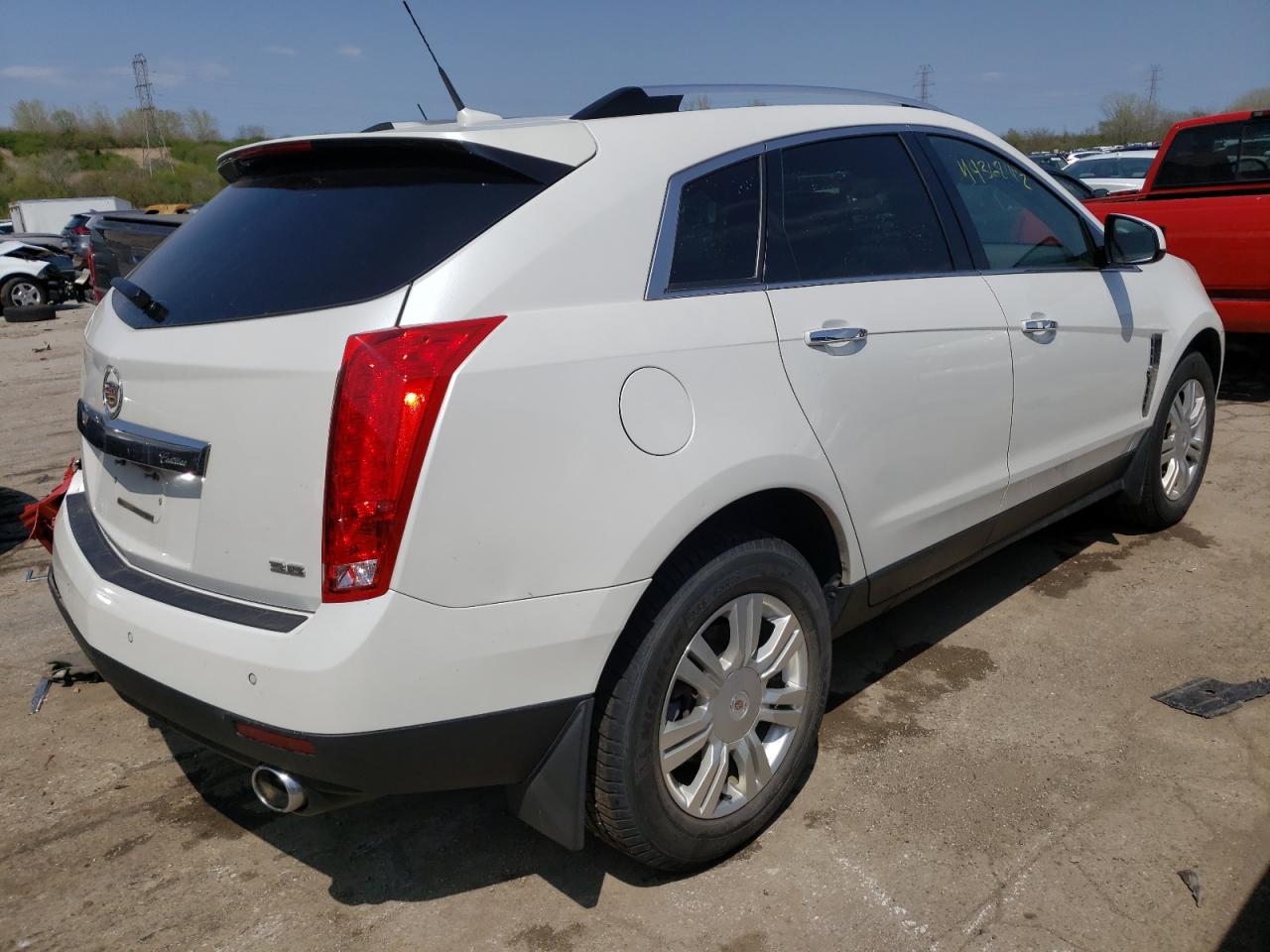 Photo 4 from auction – 2012 CADILLAC SRX LUXURY with VIN 3GYFNAE36CS621478