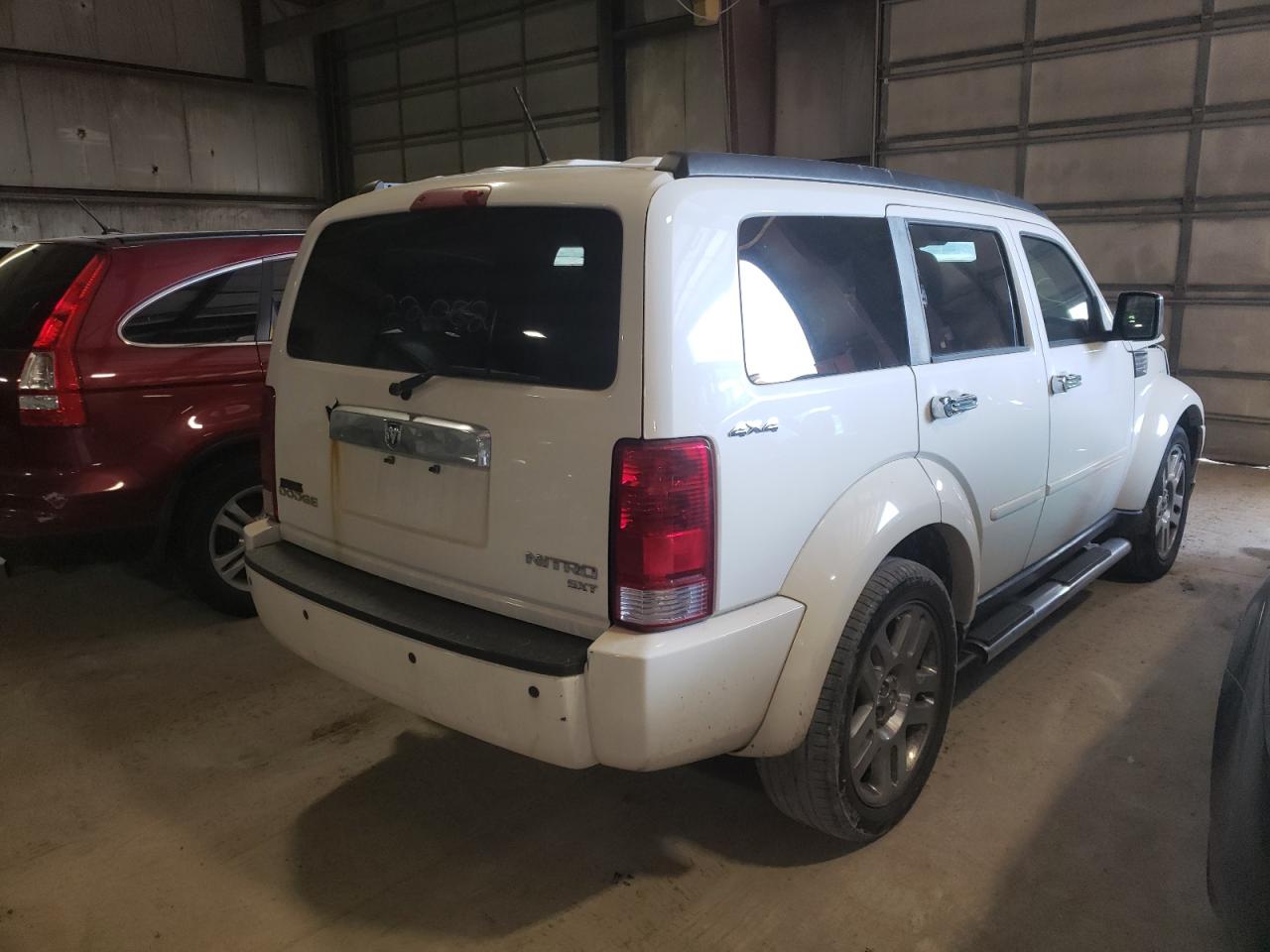 Photo 4 from auction – 2010 DODGE NITRO SXT with VIN 1D4PU5GK9AW118427