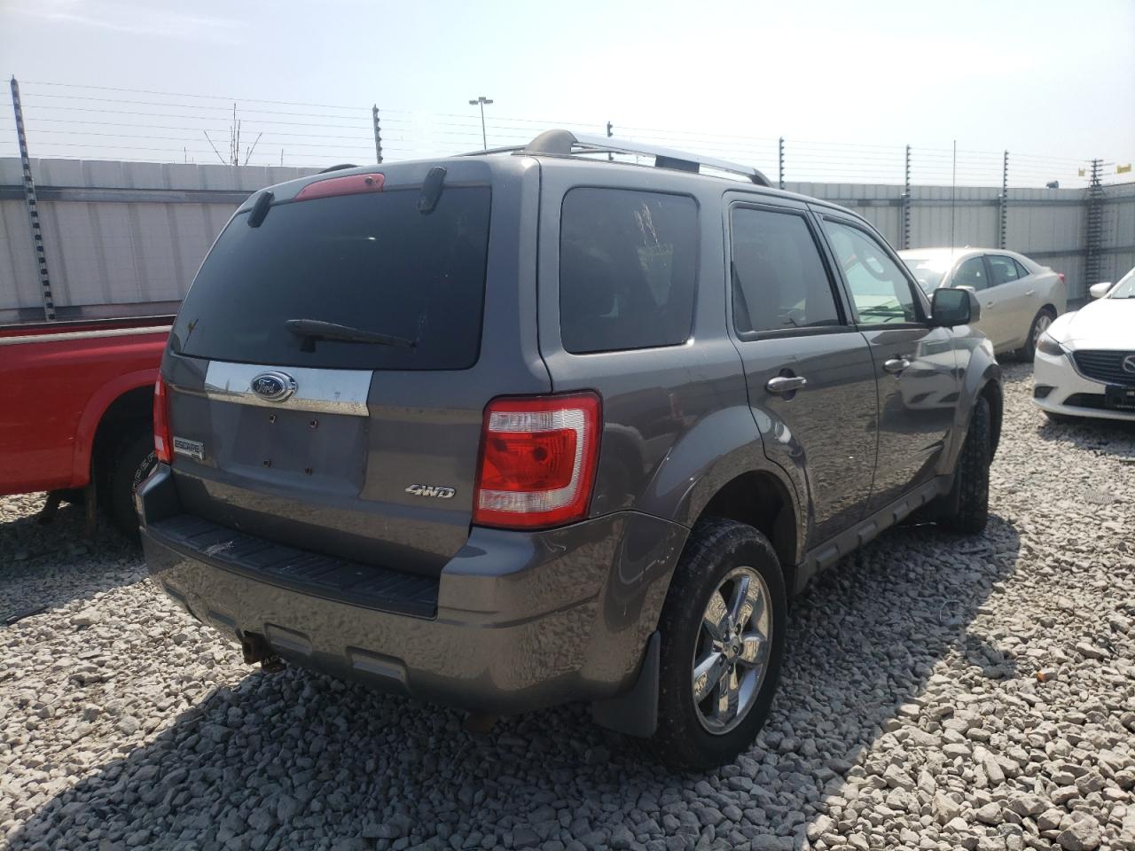 Photo 4 from auction – 2009 FORD ESCAPE LIM with VIN 1FMCU94G89KD07202