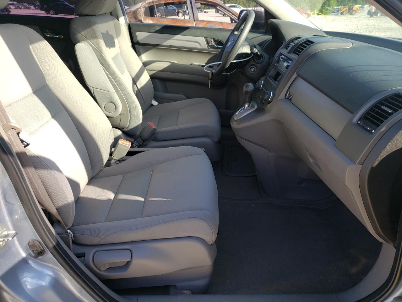 Photo 5 from auction – 2011 HONDA CR-V LX with VIN 5J6RE3H34BL019350